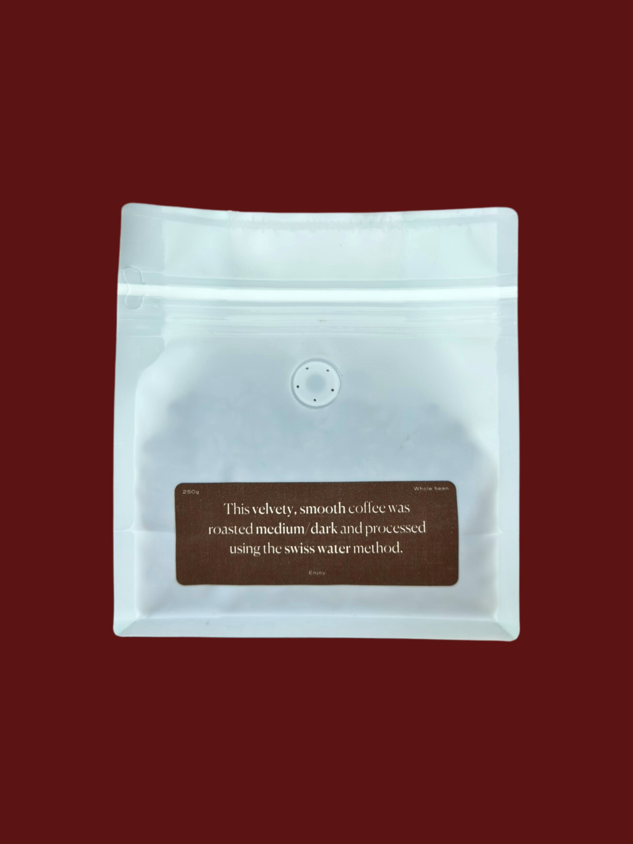 White coffee packaging with a brown label on a red background